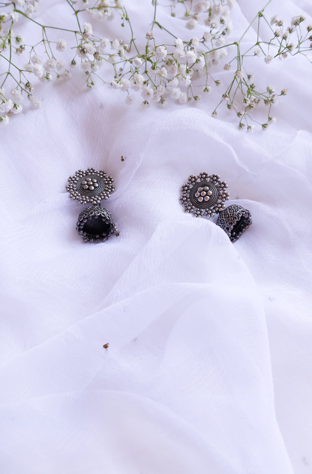 Floral Black toned Oxidised Jhumkas
