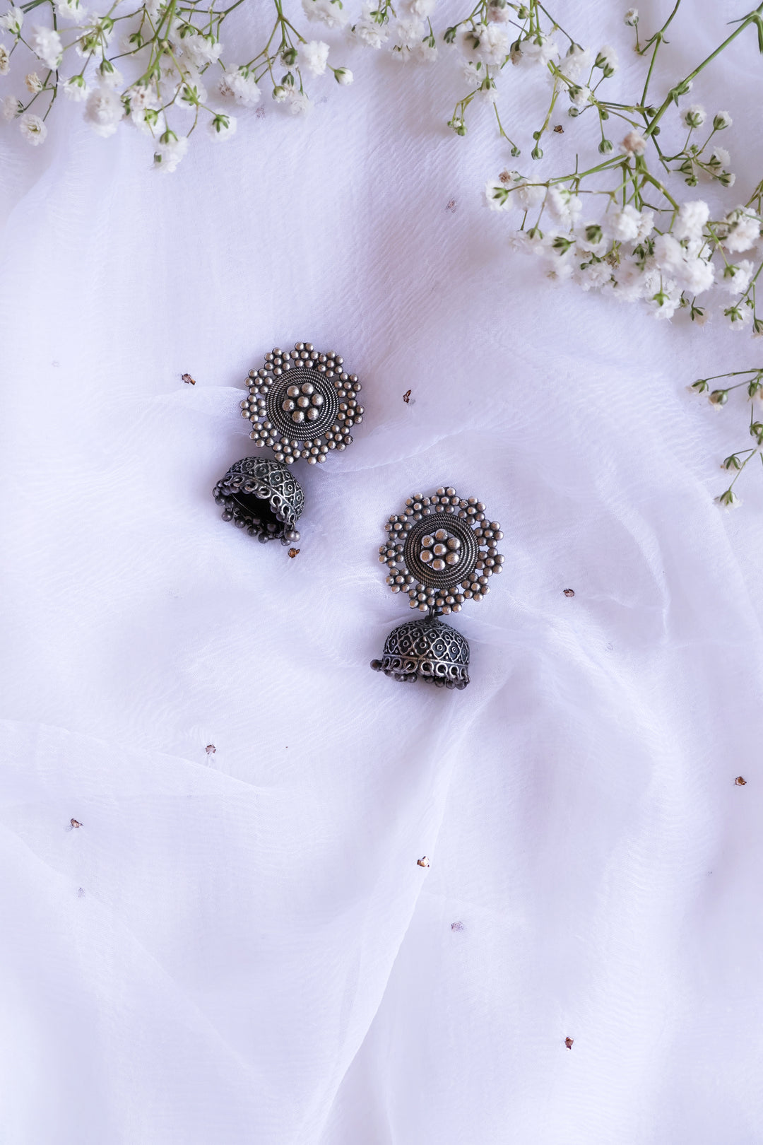 Floral Black toned Oxidised Jhumkas