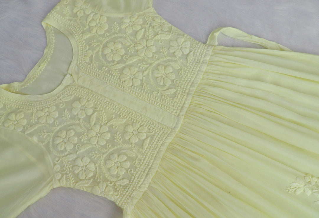 Aafiyat Pure Muslin Butter Yellow Chikankari Fit and Flare dress