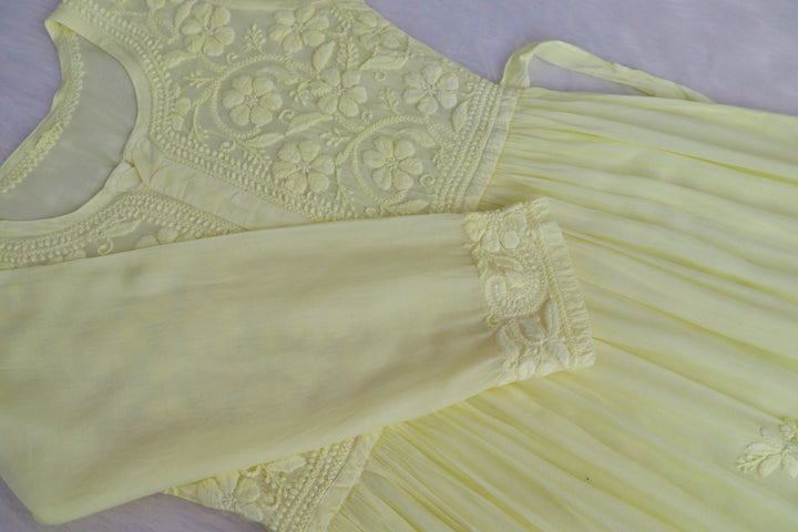 Aafiyat Pure Muslin Butter Yellow Chikankari Fit and Flare dress